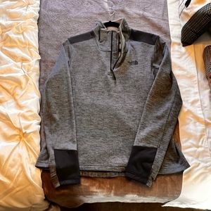 Womens half zip with thumb holes.